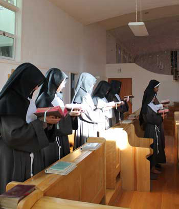 Nuns in chapel praying